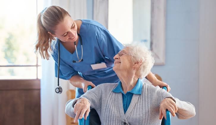 Caregiver supporting an older adult